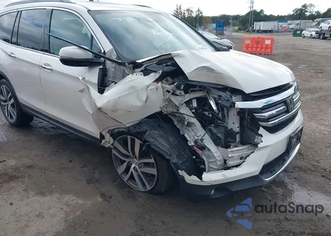 2017 Honda Pilot Elite z USA, uszkodzony, nr VIN 5FNYF6H07HB042199